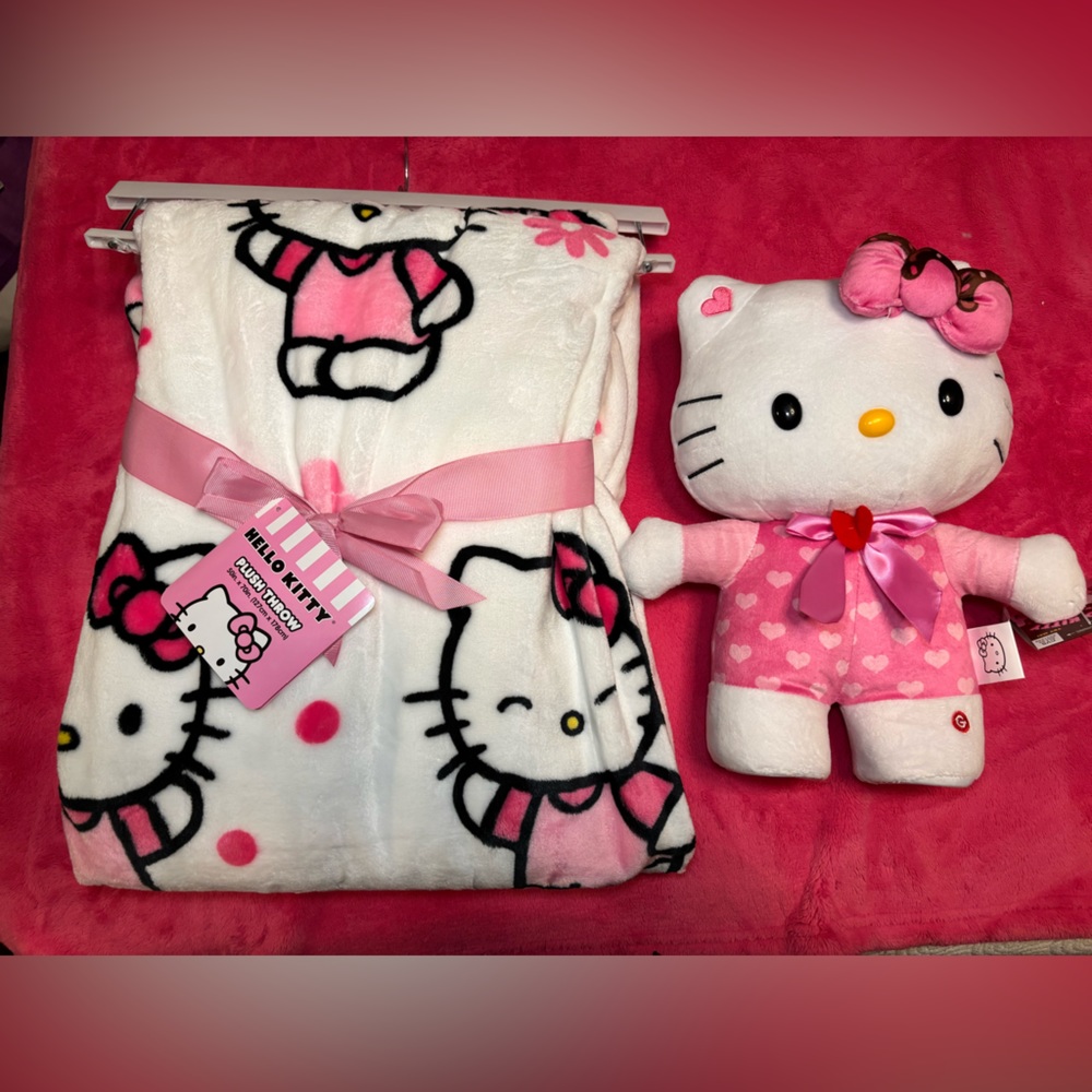 Hello kitty dancing greeter and hello kitty daisy blanket